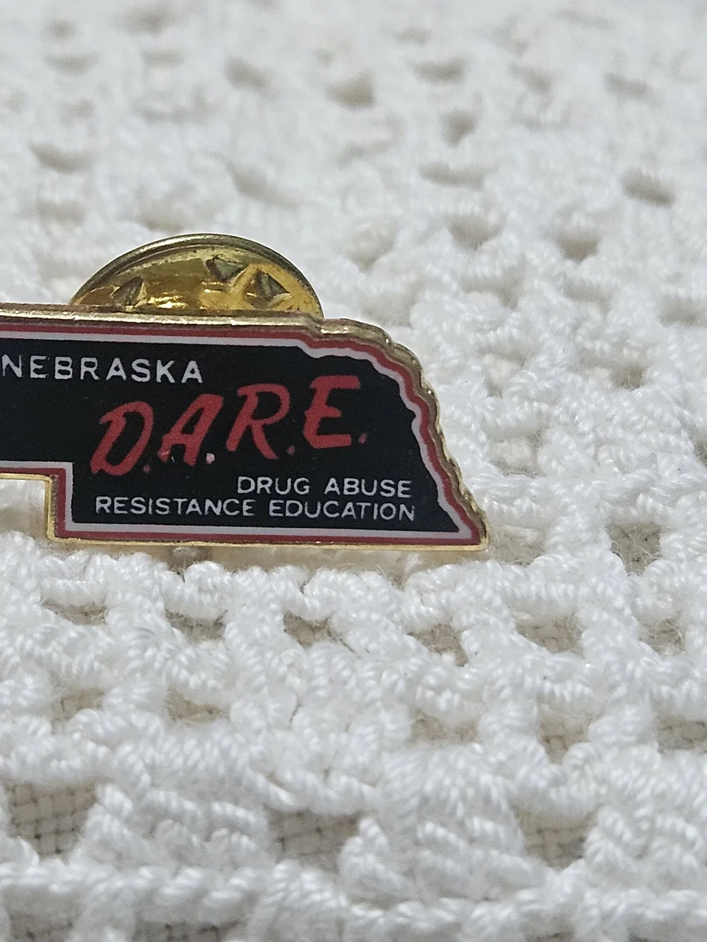 Nebraska D.A.R.E. Enamel Pin - Black and Red